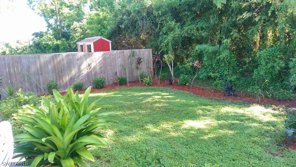 17501 Butler Road Fort Myers, FL 33967 - Photo 14 of 20 a garden view with a seating space