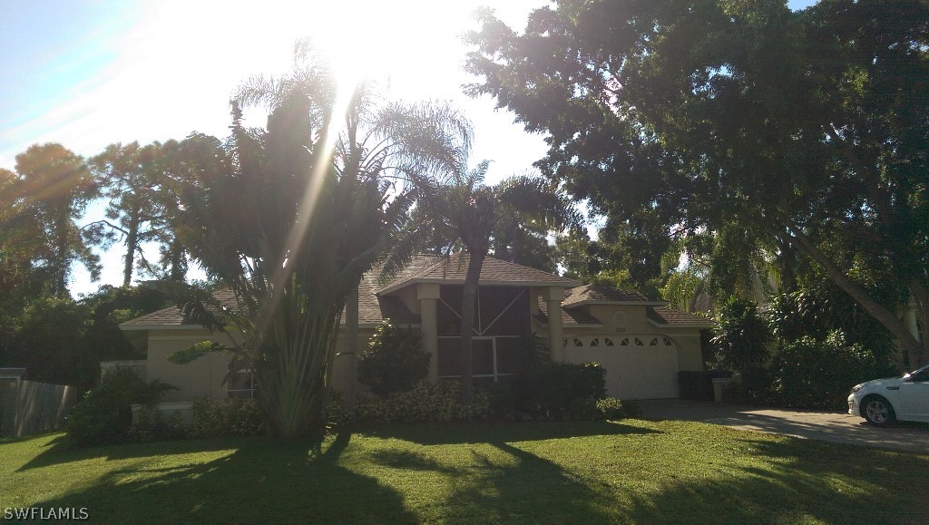 17501 Butler Road Fort Myers, FL 33967 - Photo 2 of 20 a view of a back yard of the house