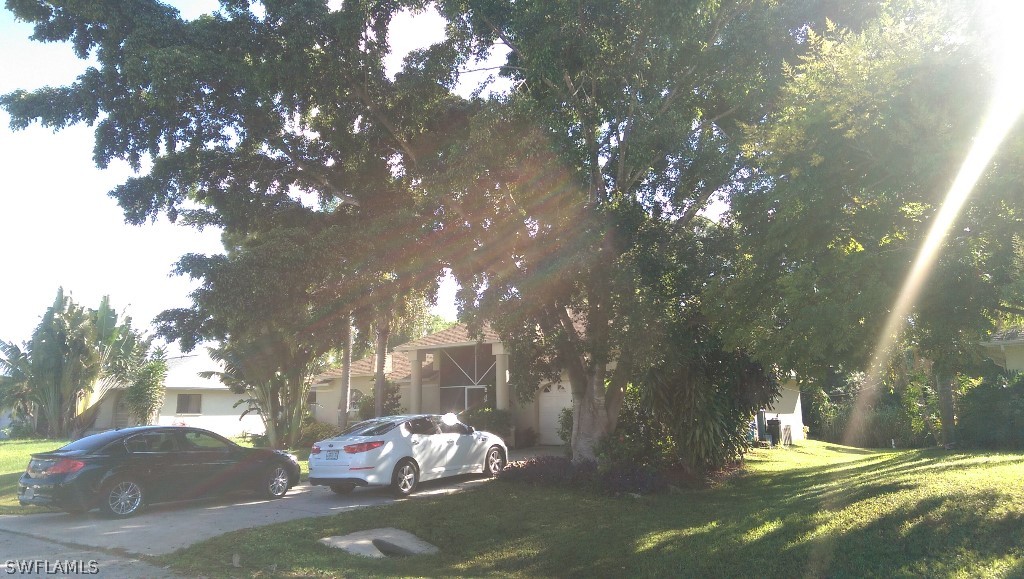 17501 Butler Road Fort Myers, FL 33967 - Photo 3 of 20 a view of a park with large trees