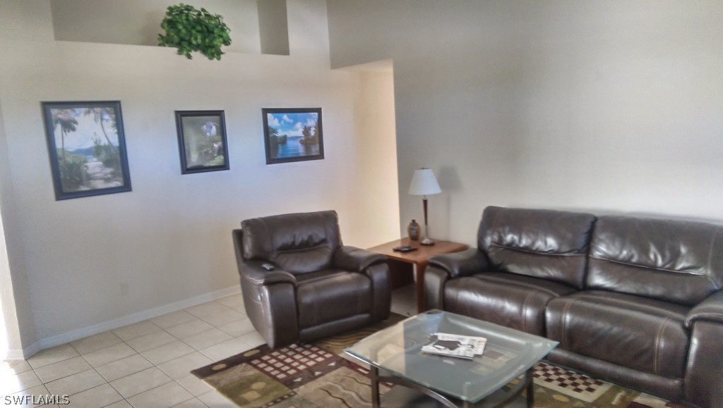 17501 Butler Road Fort Myers, FL 33967 - Photo 5 of 20 a living room with furniture and a window