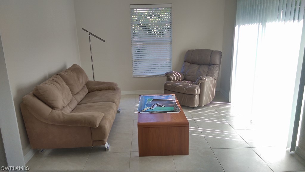 17501 Butler Road Fort Myers, FL 33967 - Photo 10 of 20 a living room with furniture and a window