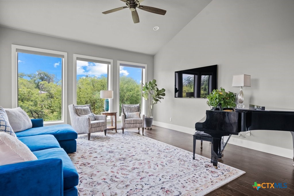 1165 Turtle Trail New Braunfels, TX 78130 - Photo 11 of 48 a living room with furniture and a window