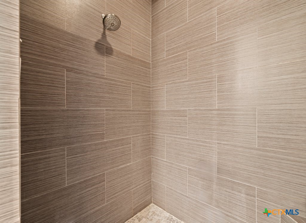 1165 Turtle Trail New Braunfels, TX 78130 - Photo 19 of 48 a bathroom with a shower