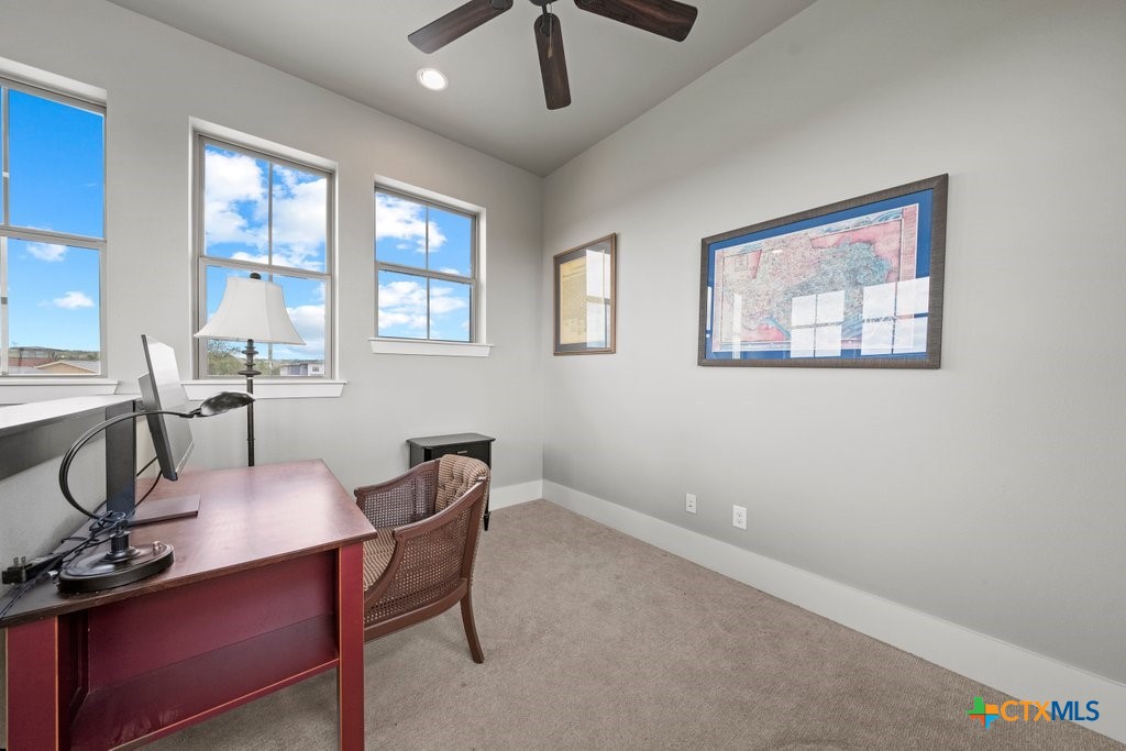 1165 Turtle Trail New Braunfels, TX 78130 - Photo 34 of 48 a workspace with furniture and window