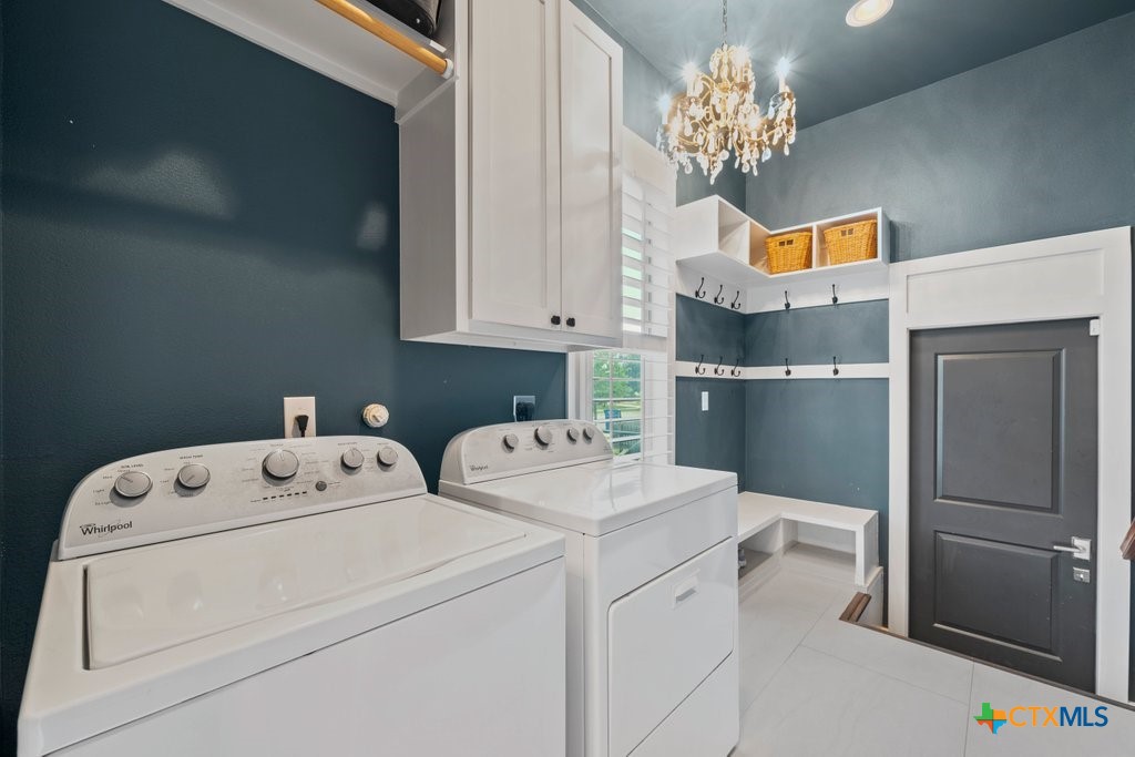 1165 Turtle Trail New Braunfels, TX 78130 - Photo 36 of 48 a utility room with dryer and washer