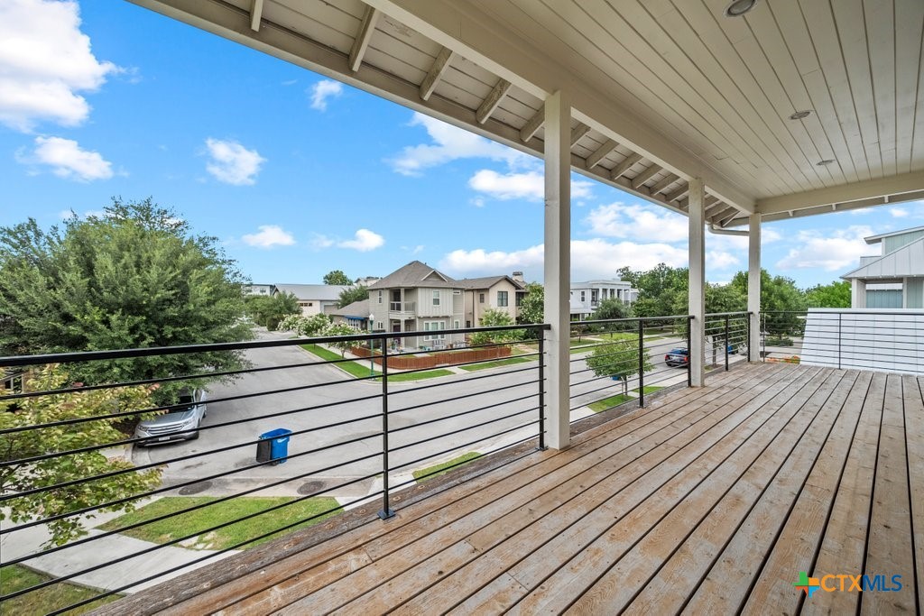 1165 Turtle Trail New Braunfels, TX 78130 - Photo 37 of 48 a view of a balcony with wooden floor