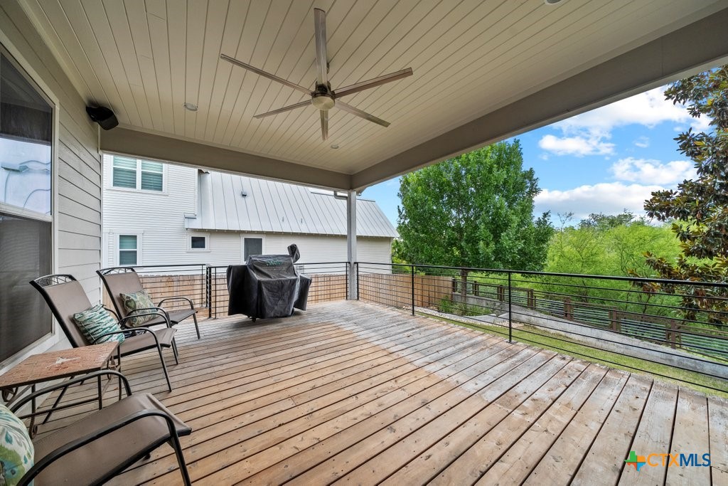 1165 Turtle Trail New Braunfels, TX 78130 - Photo 39 of 48 a view of a living room with furniture and a fireplace