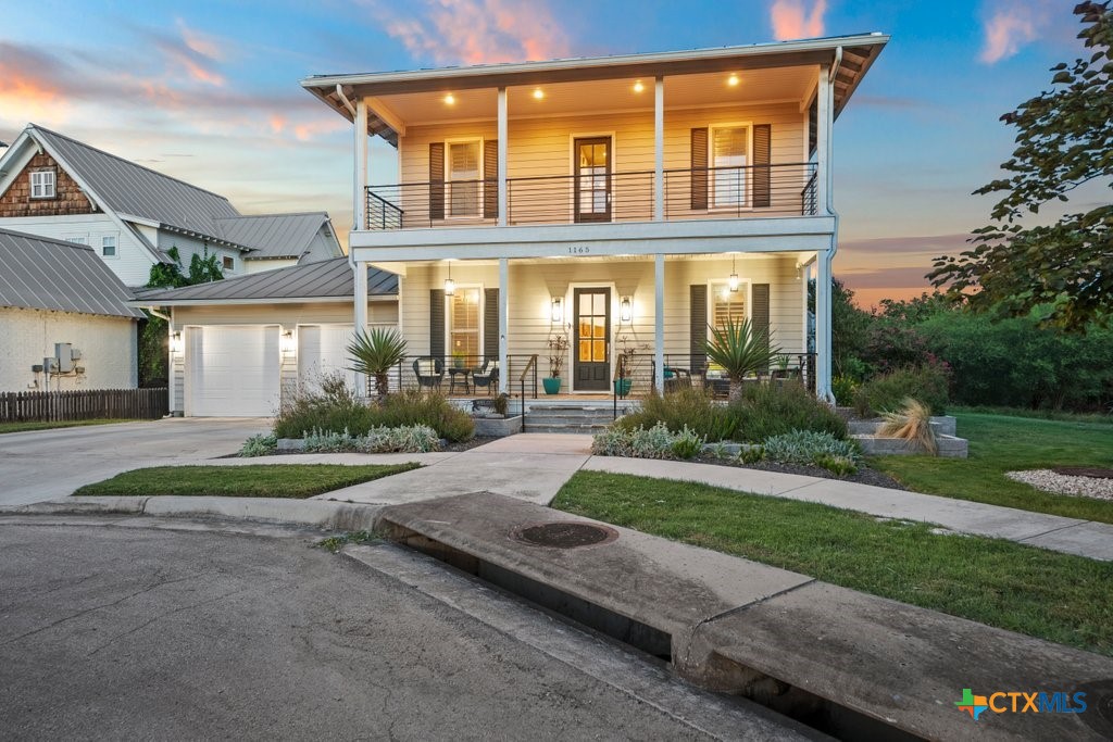 1165 Turtle Trail New Braunfels, TX 78130 - Photo 47 of 48 front view of a house with a yard