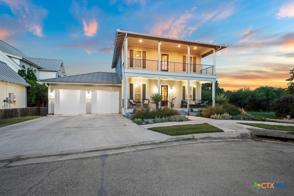 1165 Turtle Trail New Braunfels, TX 78130 - Photo 48 of 48 a front view of a house with garden