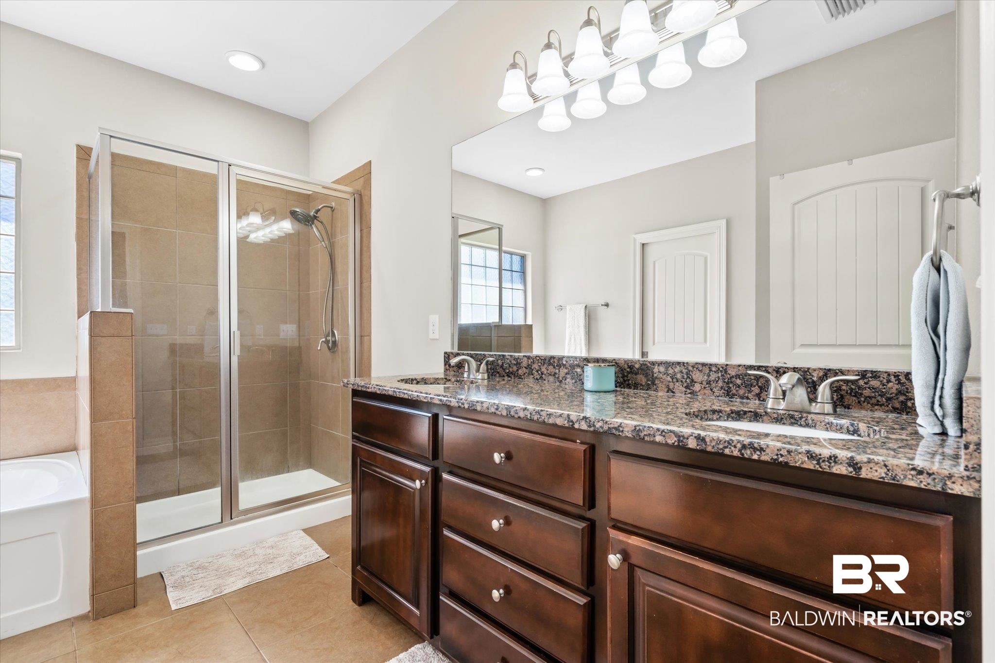 22640 Nana Loop East Silverhill, AL 36576 - Photo 9 of 46 Bathroom featuring vanity, tile patterned floors, and shower with separate bathtub