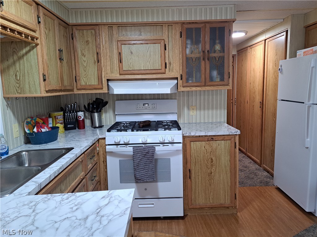 17875 Lashley Road, Unit 124 Senecaville, OH 43780 - Photo 21 of 45 Kitchen with sink and white appliances