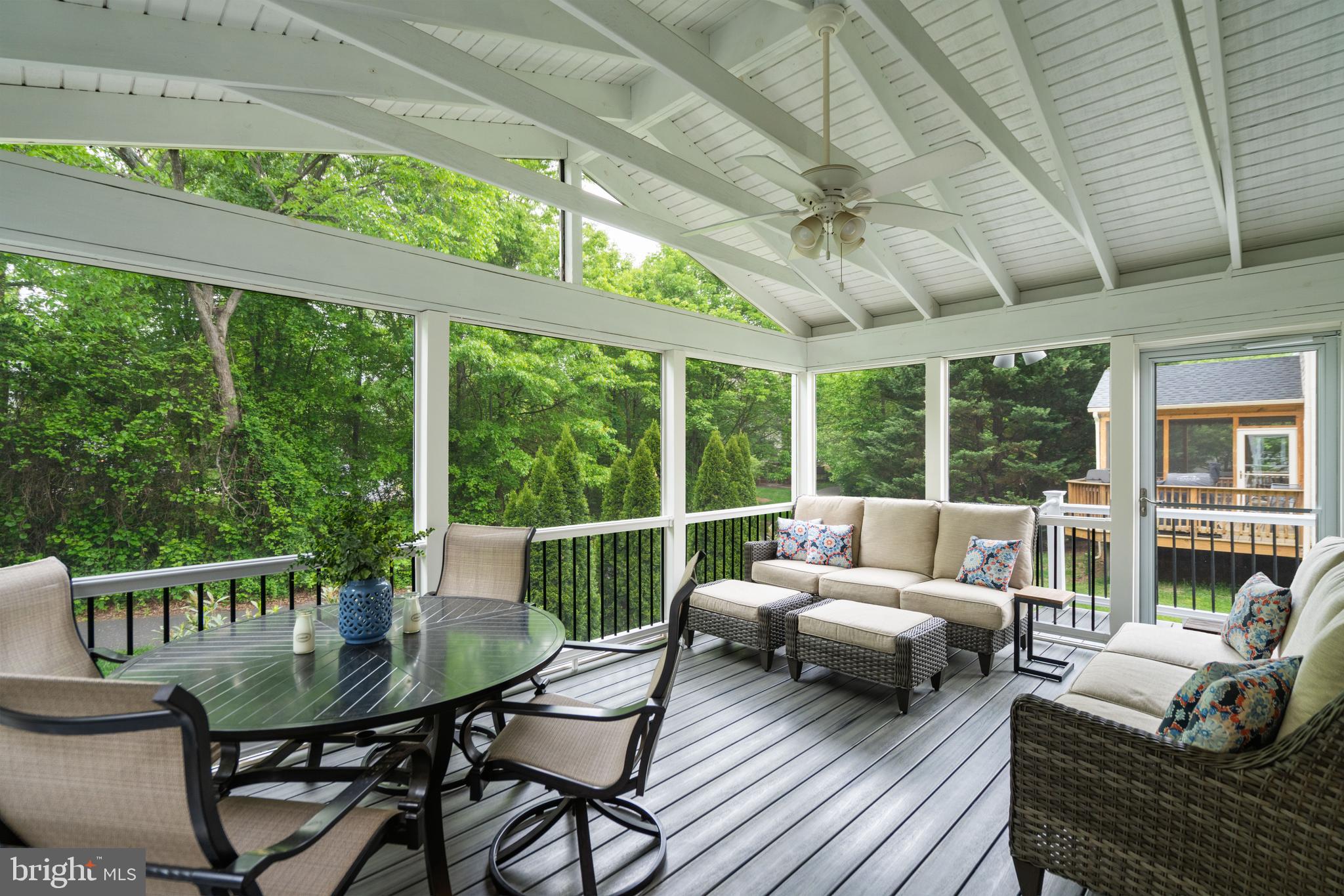 21397 Springwell Drive Ashburn, VA 20148 - Photo 13 of 43 Bright Screened Porch with Wooded Views