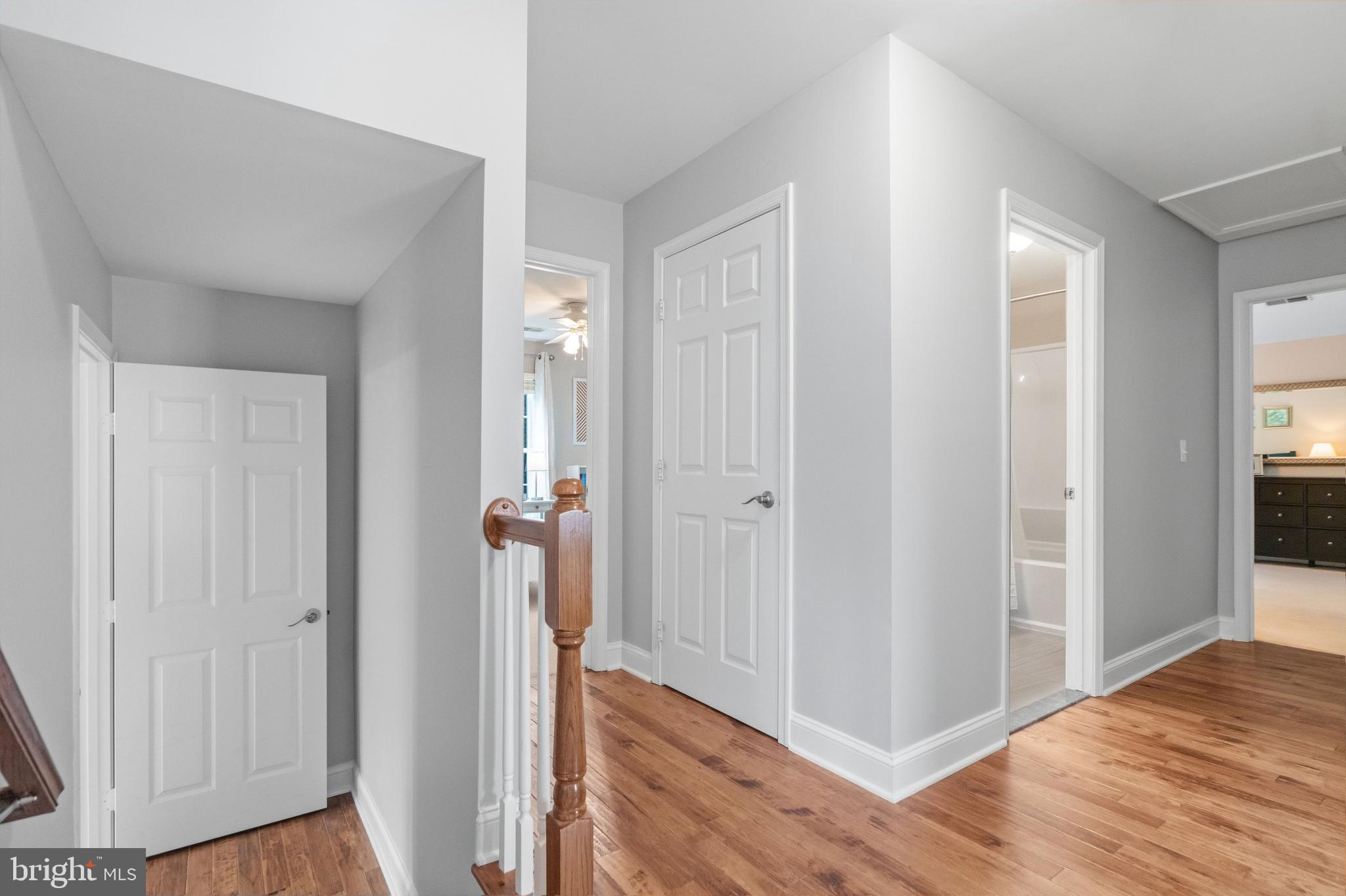 21397 Springwell Drive Ashburn, VA 20148 - Photo 21 of 43 Upper Hall with Hardwood Floors