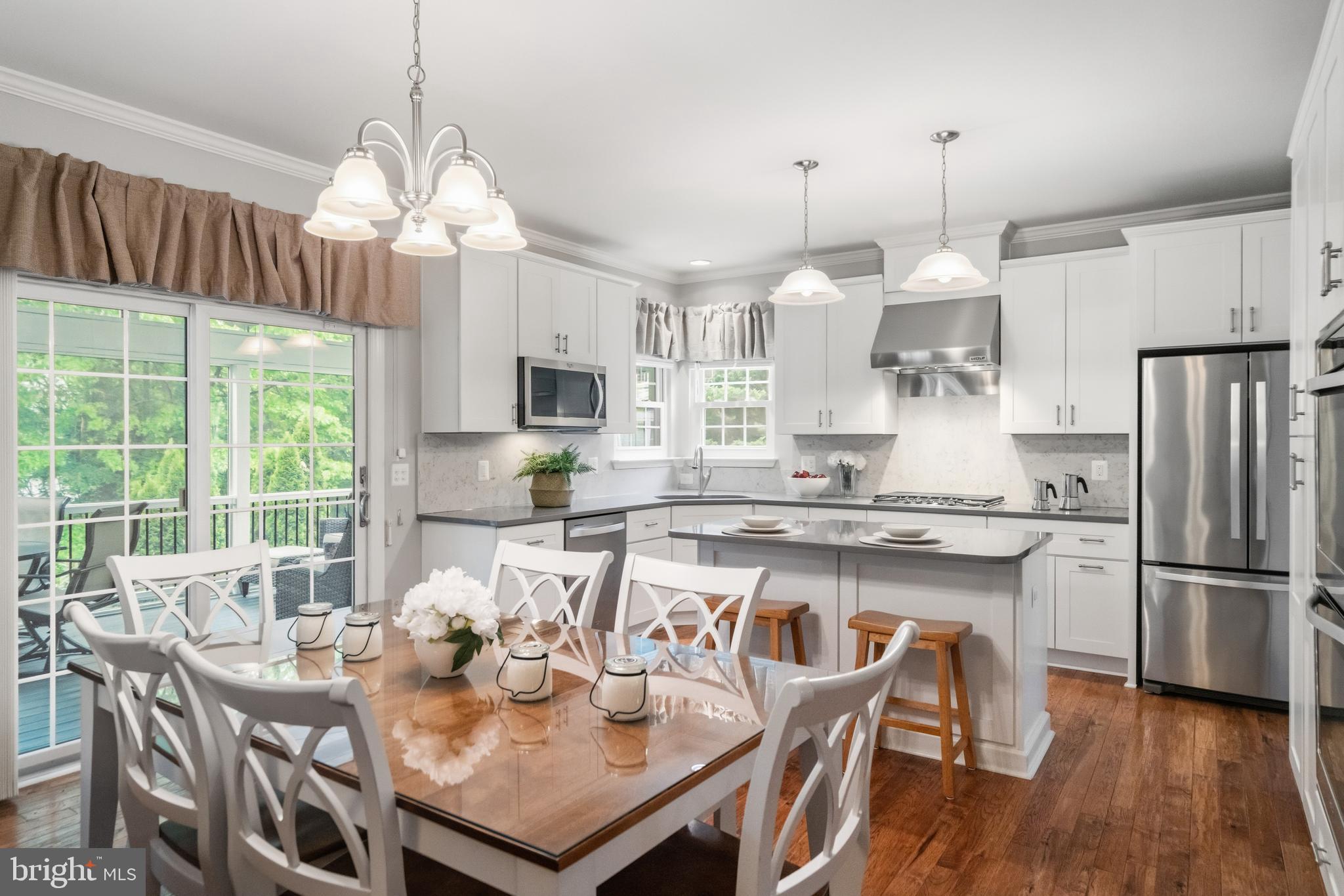 21397 Springwell Drive Ashburn, VA 20148 - Photo 9 of 43 Island Seating and Room for a Table