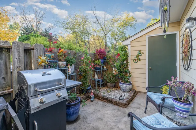 a backyard of a house with seating space