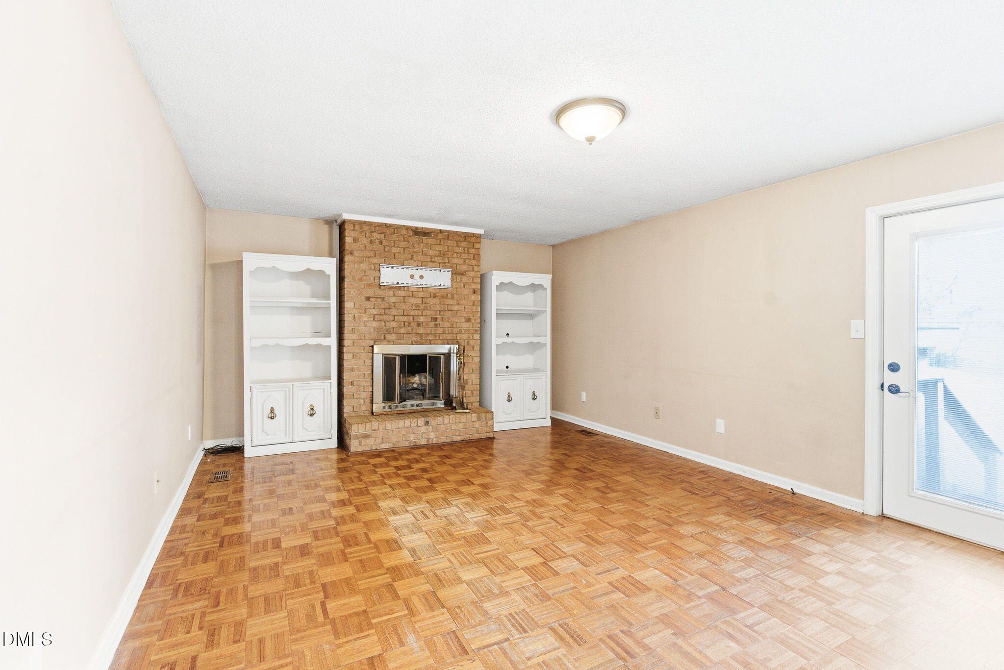 1836 Brier Lane Graham, NC 27253 - Photo 5 of 33 an empty room with a fireplace and a window