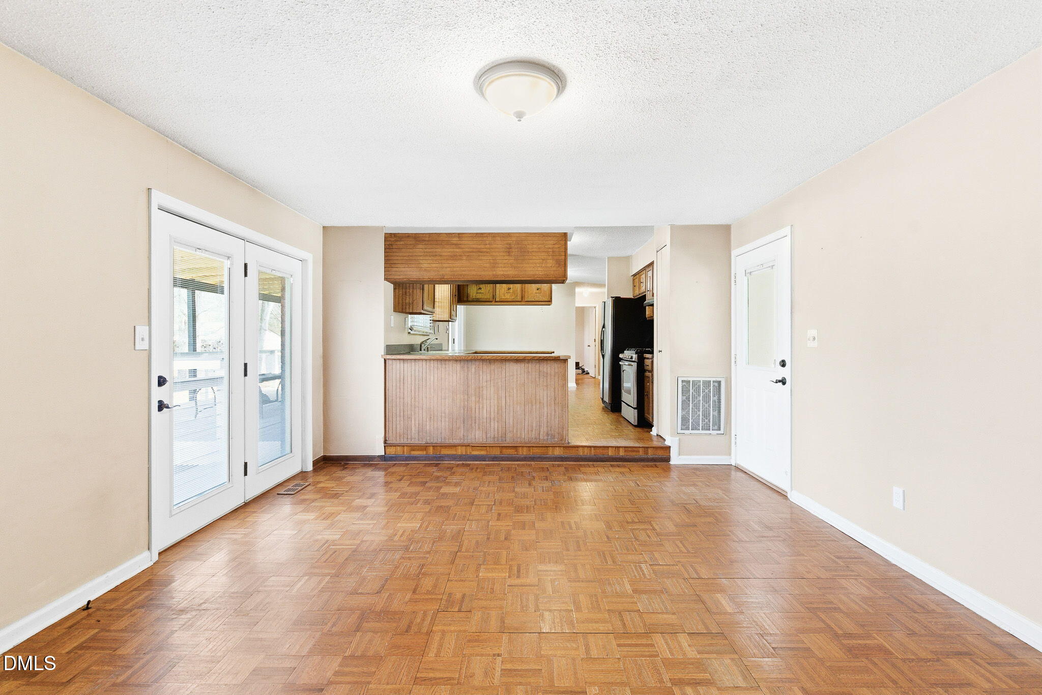 1836 Brier Lane Graham, NC 27253 - Photo 6 of 33 a view of a kitchen with furniture and an empty room
