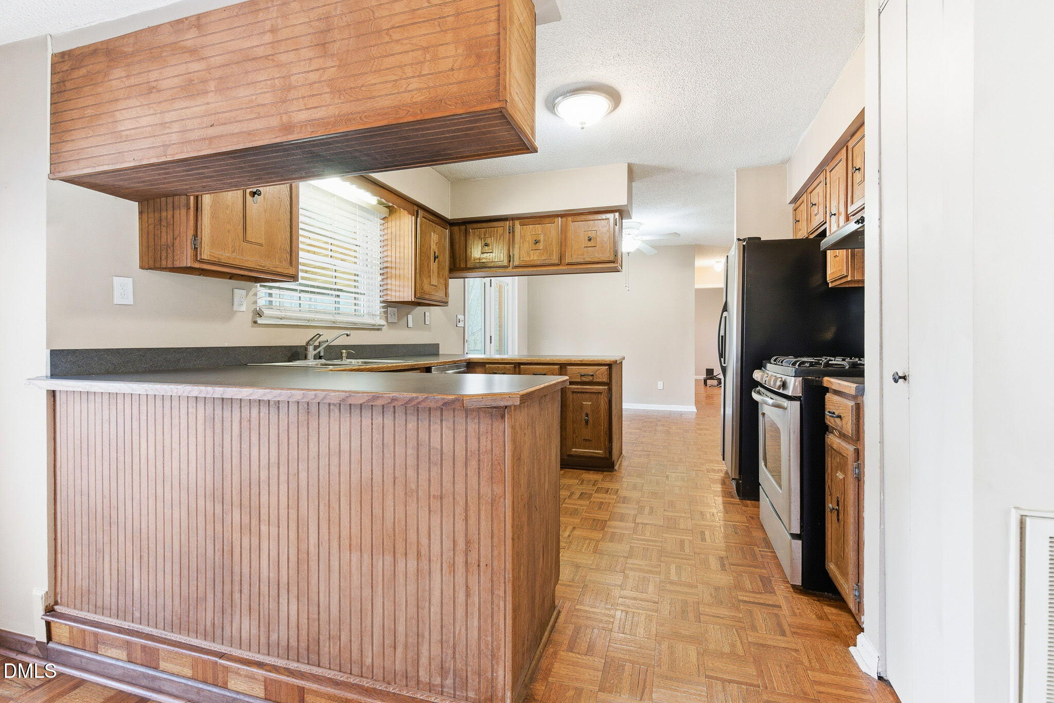 1836 Brier Lane Graham, NC 27253 - Photo 7 of 33 a kitchen with stainless steel appliances granite countertop a refrigerator and a sink