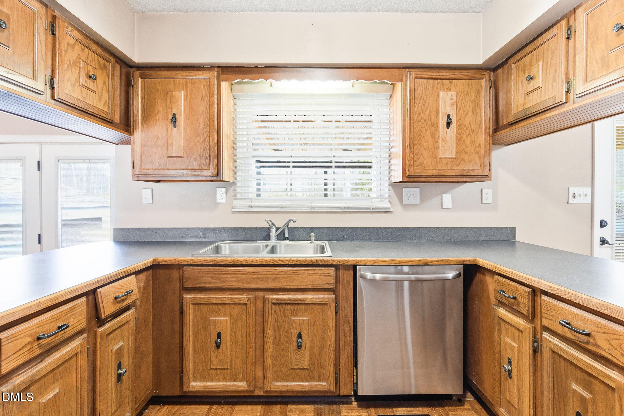 1836 Brier Lane Graham, NC 27253 - Photo 8 of 33 a kitchen with stainless steel appliances granite countertop a sink a stove and cabinets