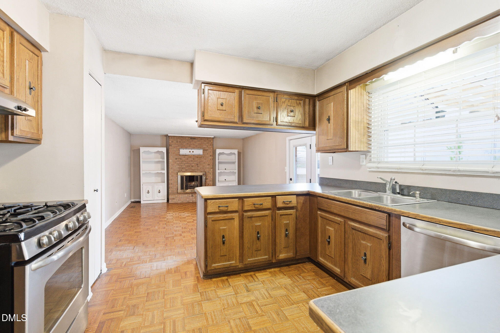 1836 Brier Lane Graham, NC 27253 - Photo 10 of 33 a kitchen with a sink stove and cabinets