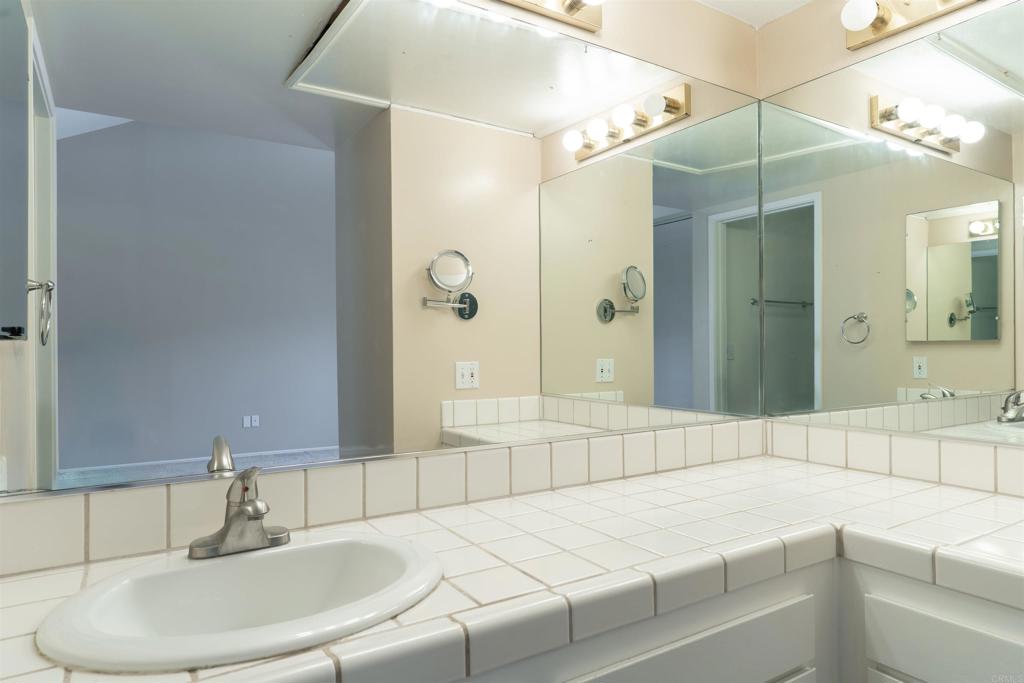 23691 Country Villa Road Ramona, CA 92065 - Photo 14 of 22 a bathroom with a sink and a mirror