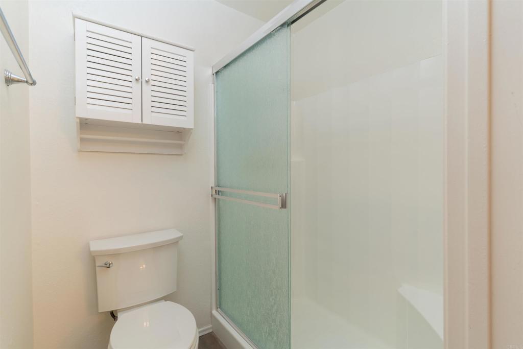 23691 Country Villa Road Ramona, CA 92065 - Photo 16 of 22 a white toilet sitting next to a window