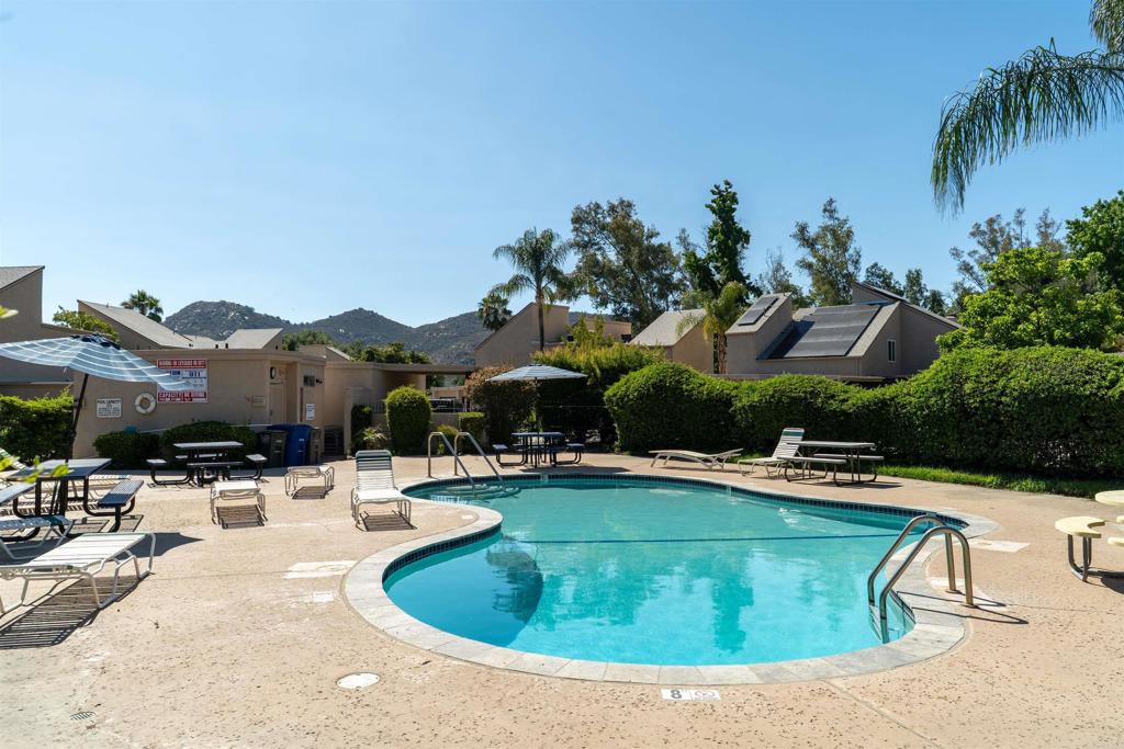 23691 Country Villa Road Ramona, CA 92065 - Photo 18 of 22 a view of a swimming pool with a patio