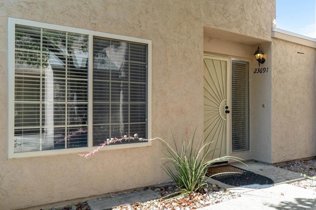 23691 Country Villa Road Ramona, CA 92065 - Photo 2 of 22 a view of balcony with a potted plant