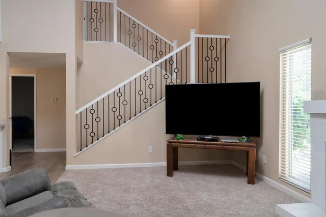 a view of a swimming pool with a yard