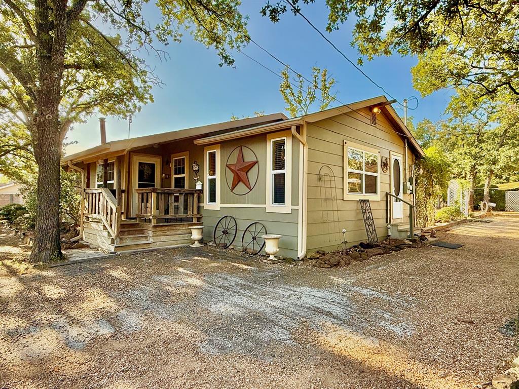 1636 Broome Road Bartonville, TX 76226 - Photo 1 of 1 a view of a house with a yard