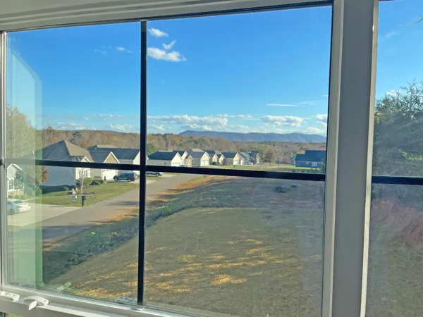 a view of swimming pool with outdoor seating space and barbeque oven