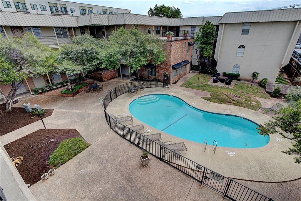 910 Duncan Lane, Unit 7 Austin, TX 78705 - Photo 20 of 20 an aerial view of a house with yard and patio
