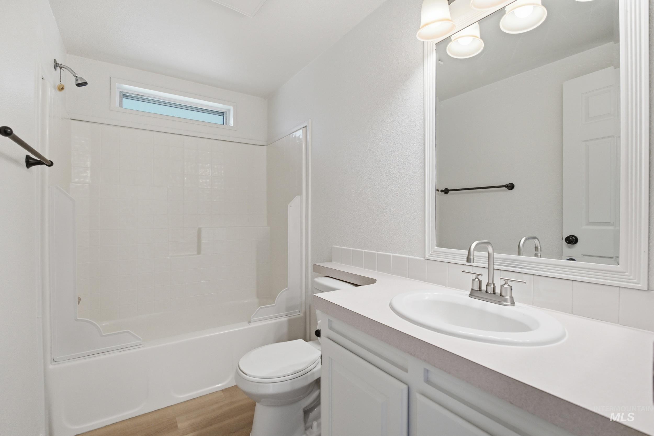 7422 Track Road Nampa, ID 83686 - Photo 29 of 50 Bedroom with light gray carpeting and white walls