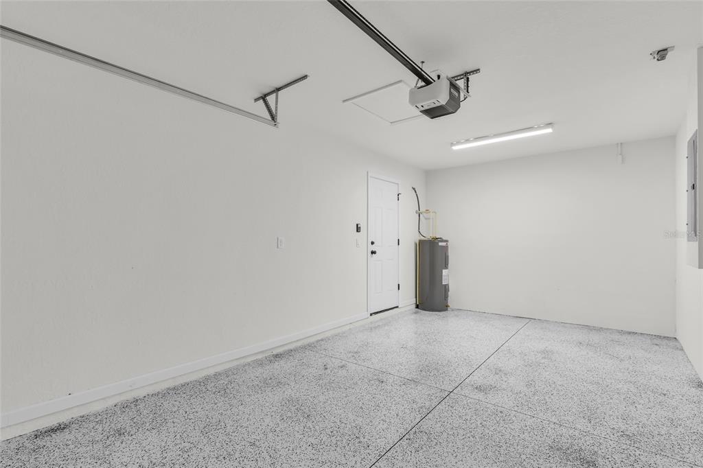 23711 Southwest Rainbow Lakes Boulevard Dunnellon, FL 34431 - Photo 23 of 27 a view of a livingroom with a ceiling fan and window