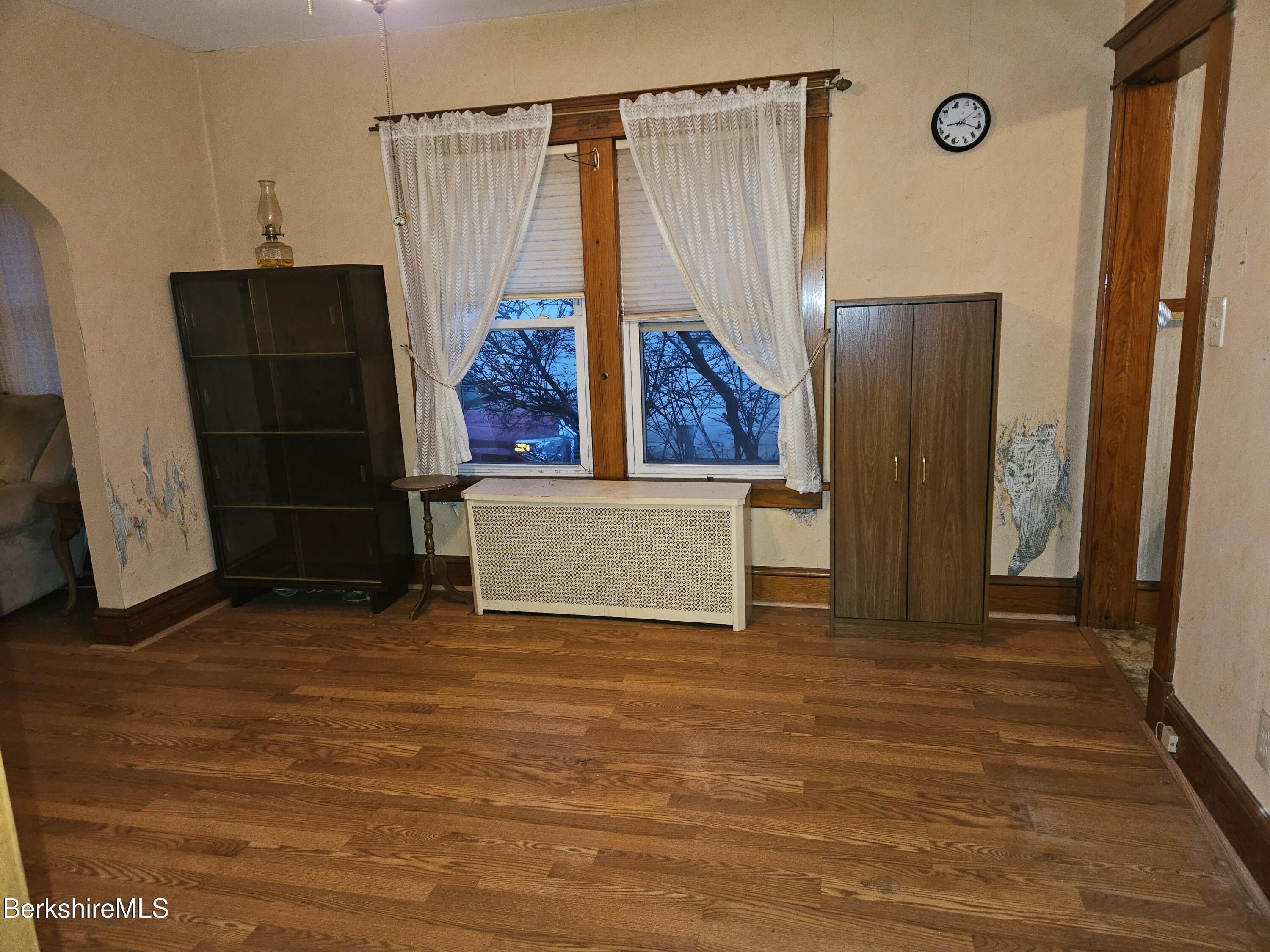 269 2nd Street Pittsfield, MA 01201 - Photo 11 of 39 a view of a room with wooden floor and a cabinet