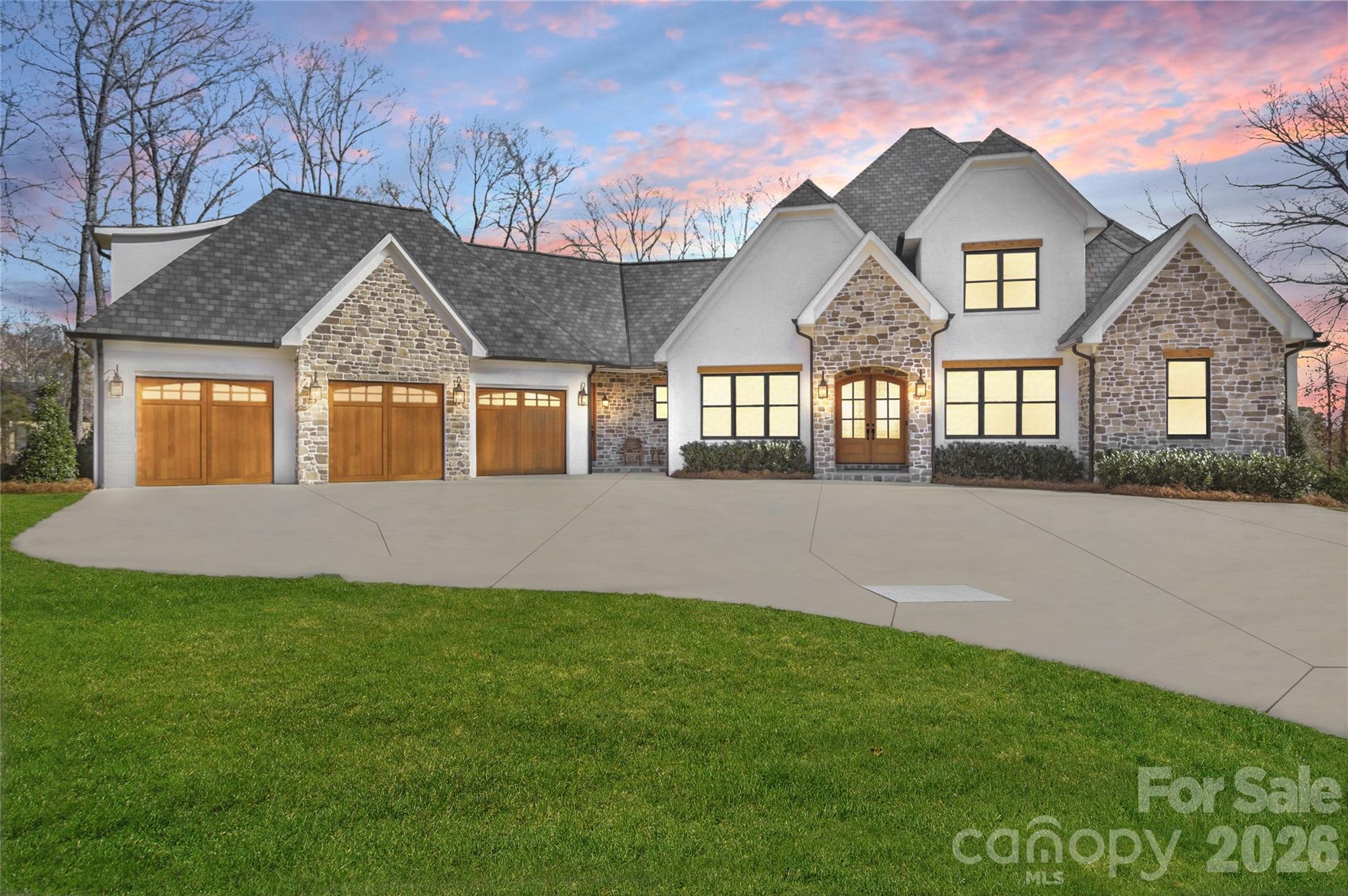 7056 Ridgeview Lane Iron Station, NC 28080 - Photo 1 of 42 a front view of house with yard and green space