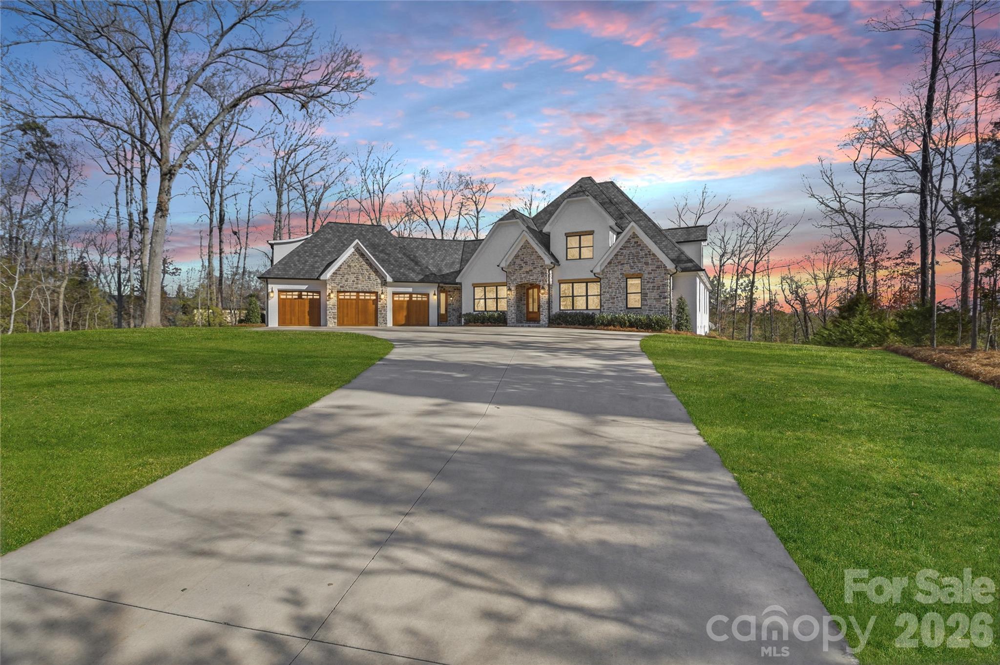 7056 Ridgeview Lane Iron Station, NC 28080 - Photo 2 of 42 a front view of a house with yard