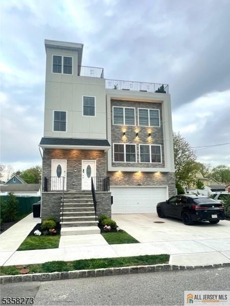 476 Meade Street, Unit 1A Orange, NJ 07050 - Photo 2 of 11 a front view of a house with garden