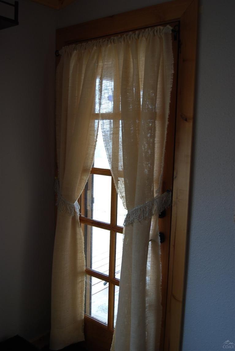 9343 Southwest Meadow Road Terrebonne, OR 97760 - Photo 8 of 23 Solid wood door with glass panes. Acces