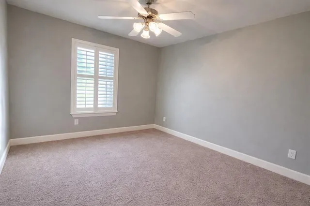 an aerial view of residential house with outdoor space and street view