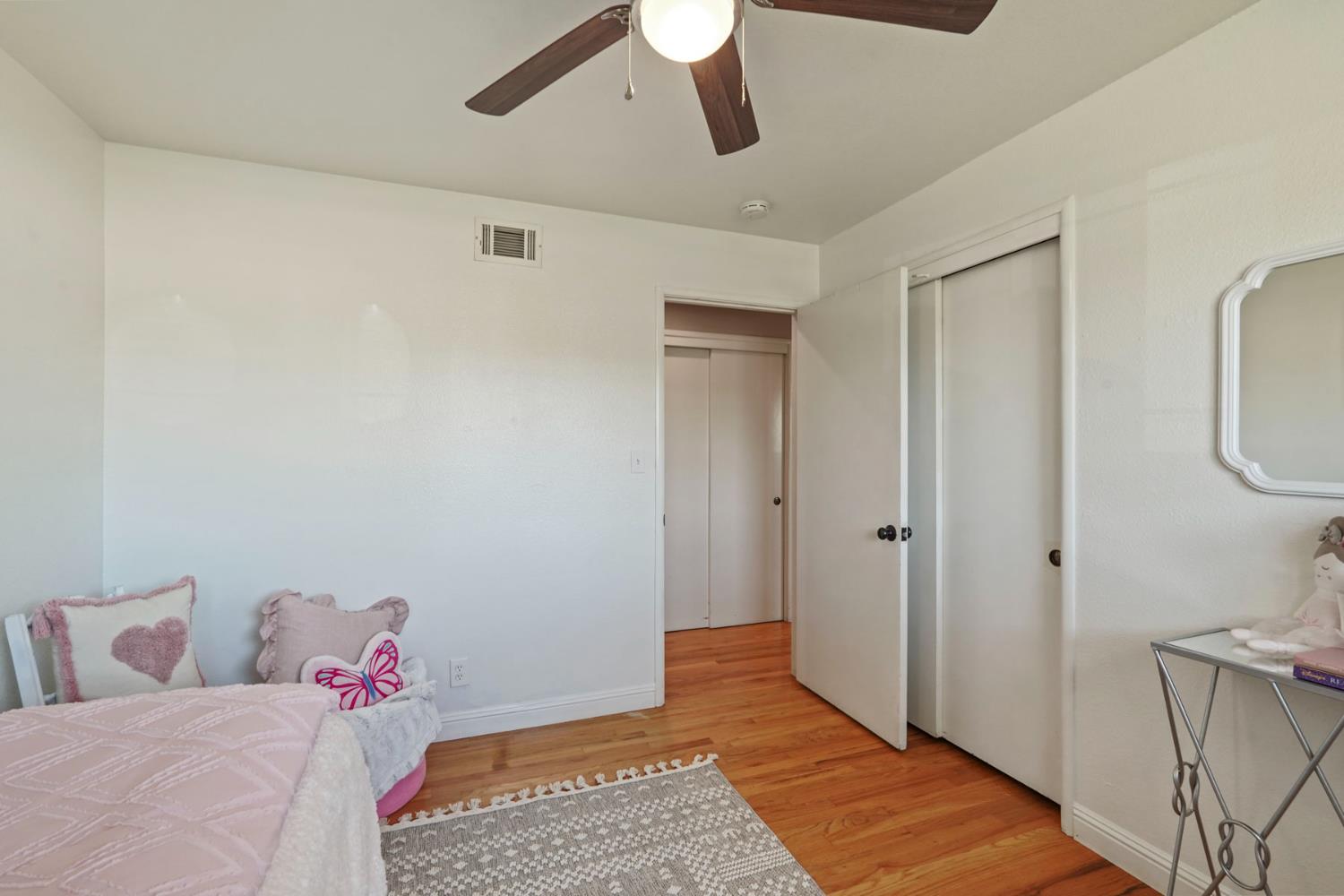 916 6th Street Ripon, CA 95366 - Photo 19 of 34 a room with a bed and a rug