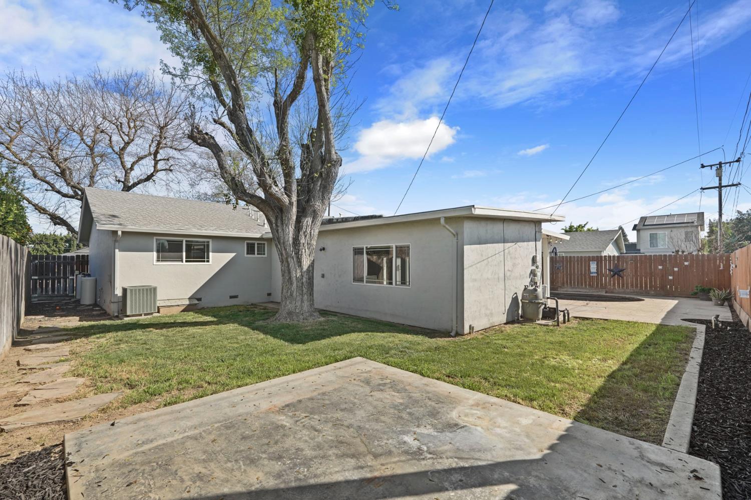 916 6th Street Ripon, CA 95366 - Photo 30 of 34 a view of a yard in front view of a house