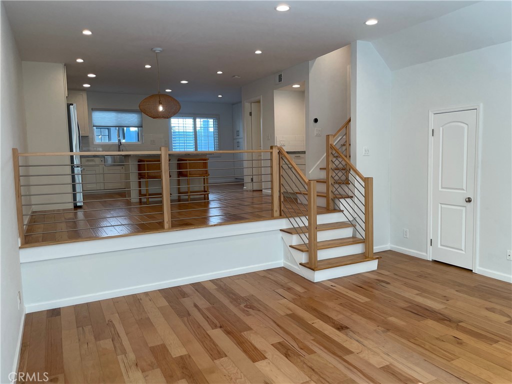 333 Virginia Street, Unit 9 El Segundo, CA 90245 - Photo 37 of 75 Living Room to Living Room Storage Closet & Upstairs Staircase