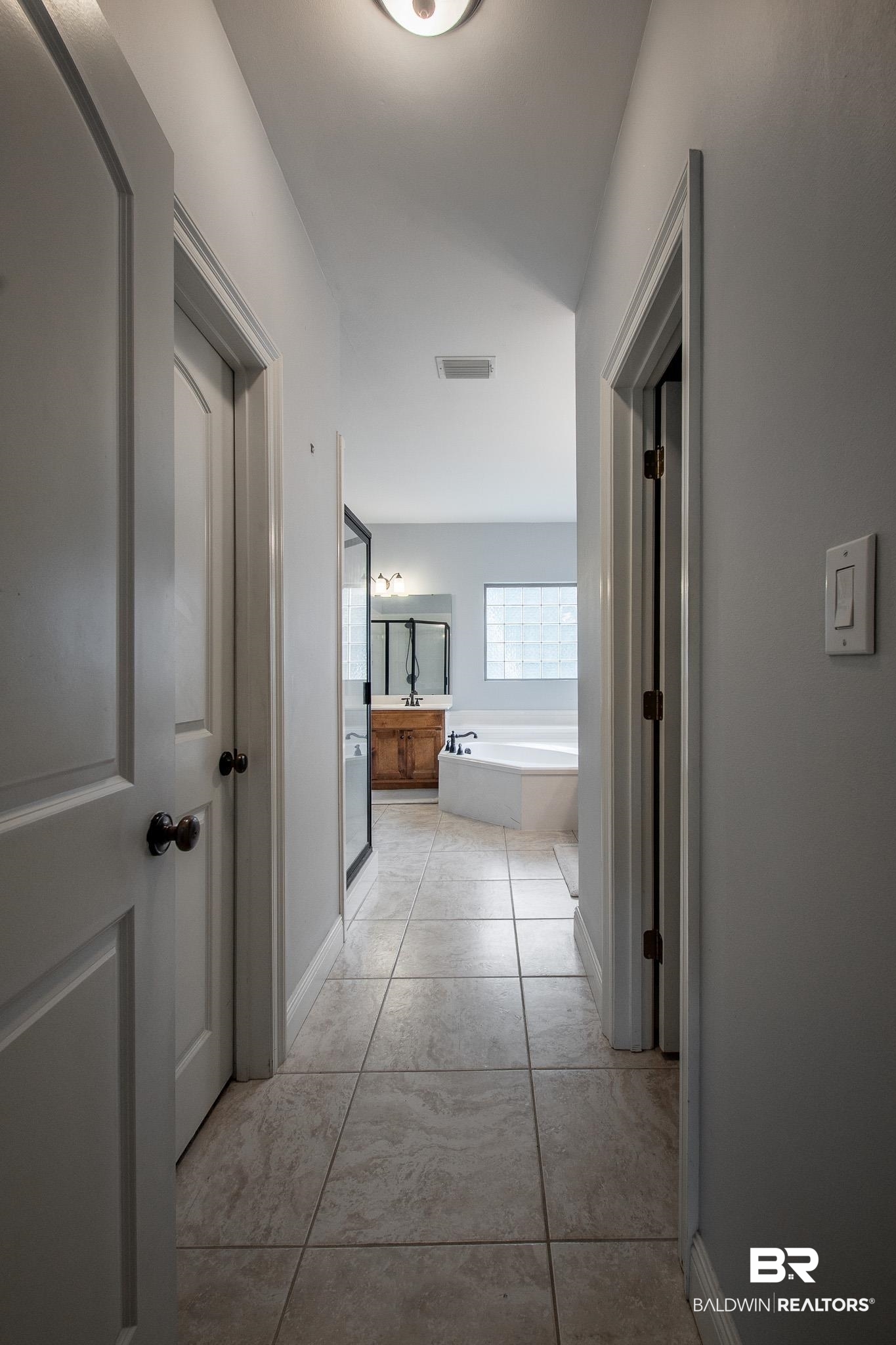 8421 Weatherford Court Daphne, AL 36527 - Photo 17 of 36 Hall featuring light tile patterned floors