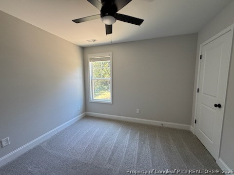 390 Summerhill Road Fayetteville, NC 28303 - Photo 24 of 27 an empty room with a window and ceiling fan