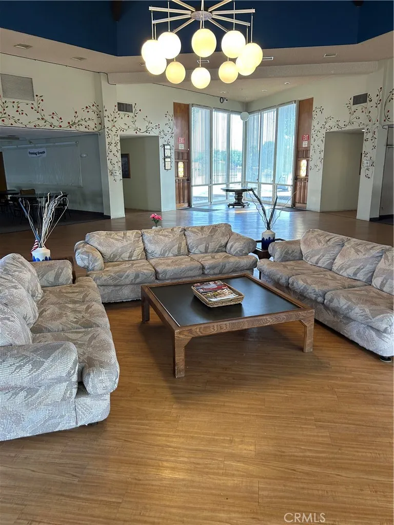 27701 Murrieta Road, Unit 228 Menifee, CA 92586 - Photo 34 of 34 a living room with furniture and a large window