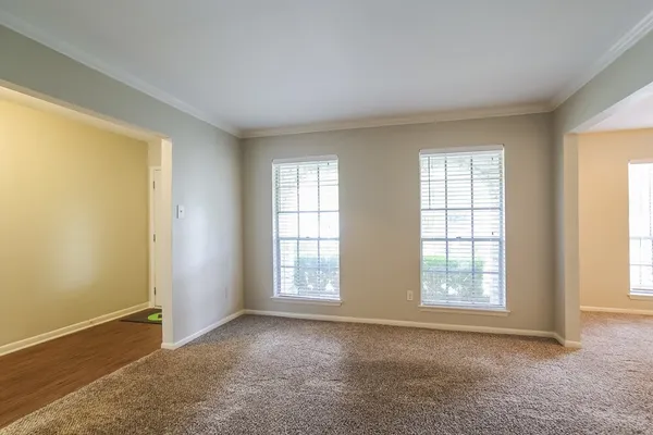 an empty room with windows