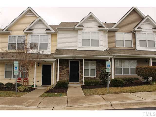 3716 Bison Hill Lane Raleigh, NC 27604 - Photo 1 of 14 a front view of a house with a yard