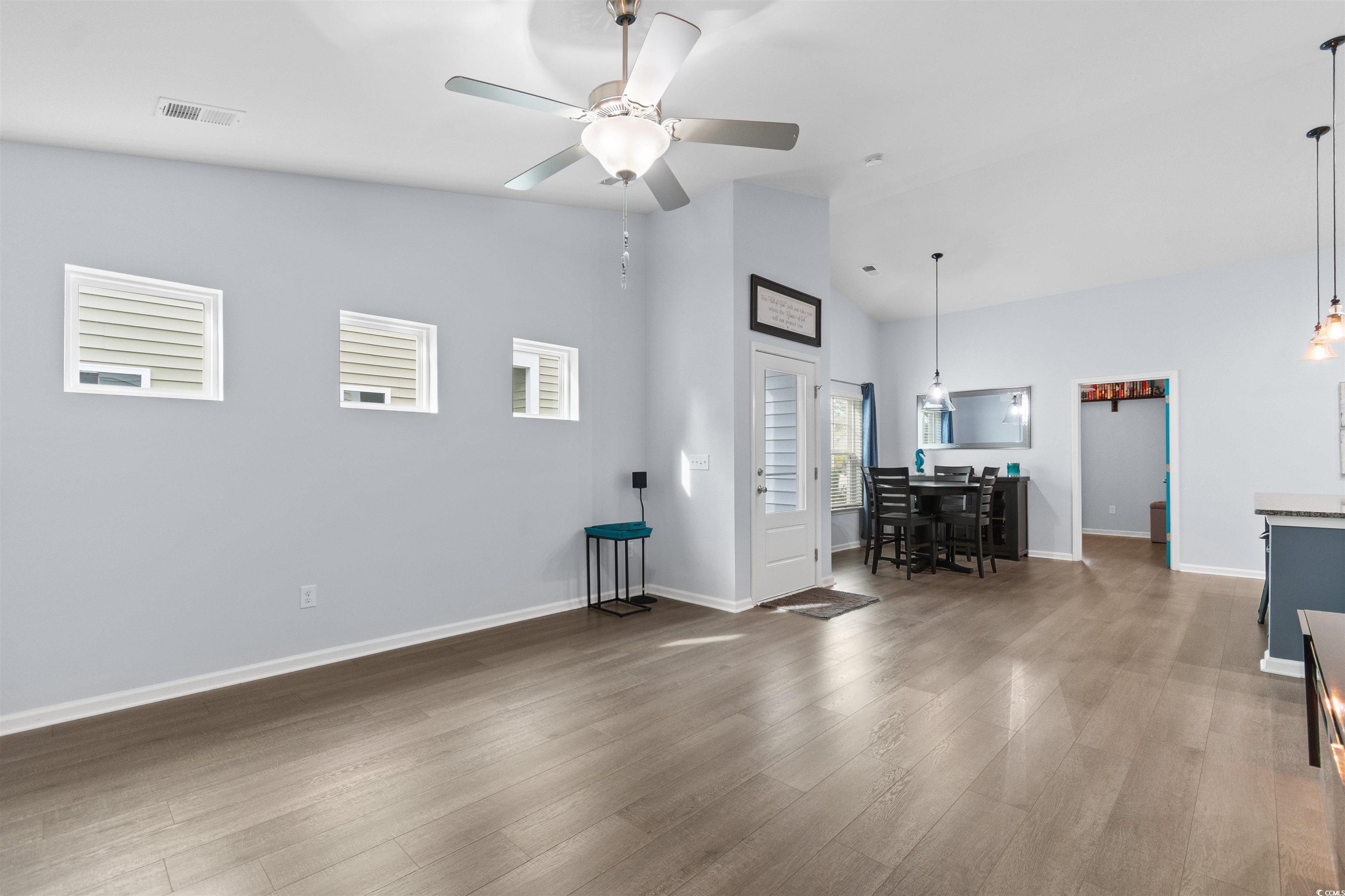 4380 Livorn Loop, Unit 4380 Myrtle Beach, SC 29579 - Photo 12 of 33 Dining space with wood finished floors