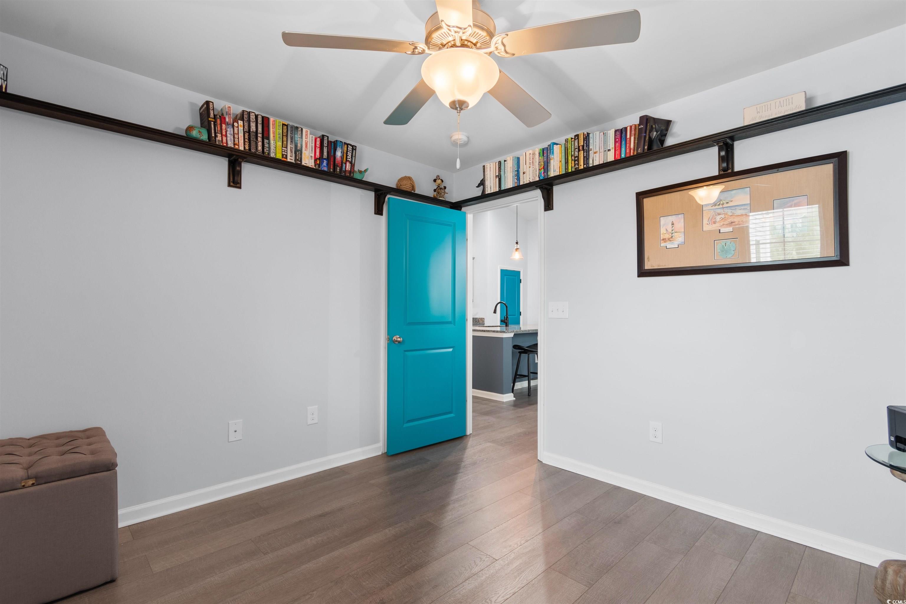 4380 Livorn Loop, Unit 4380 Myrtle Beach, SC 29579 - Photo 19 of 33 Bedroom featuring wood finished floors and a ceiling fan